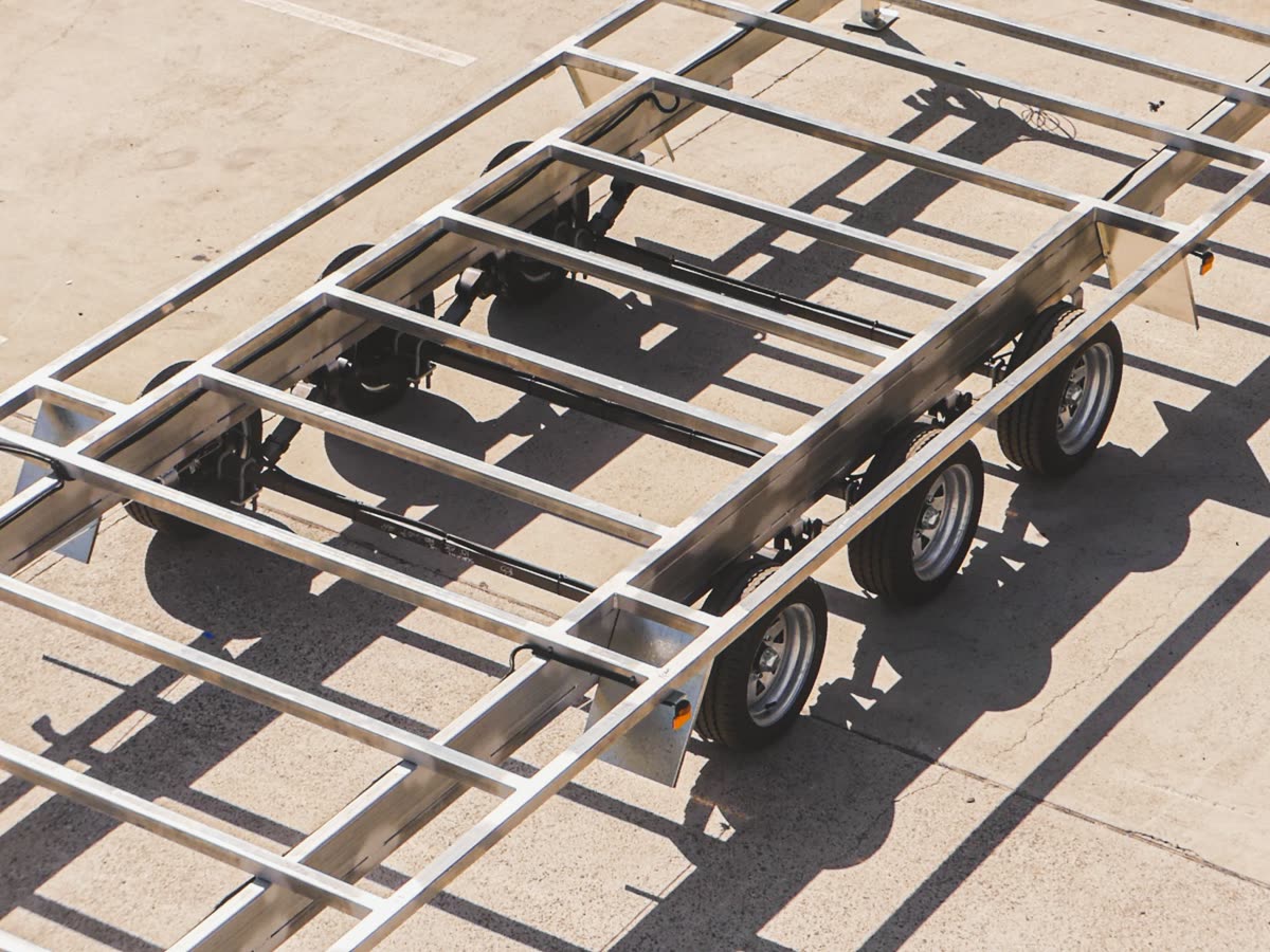 ADR-compliant tiny home trailer chassis — VIN plate fitted